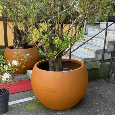 Customized Corten Steel Irregular Round Planter Boxes Streetscape Tree Pots